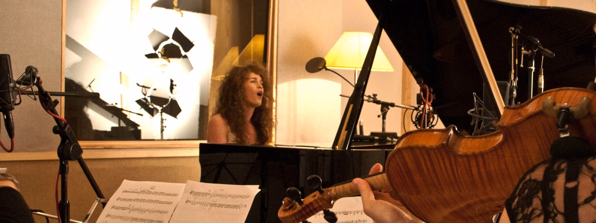 Rae Morris playing piano